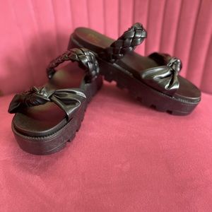 Black platform slides